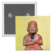 Seated figure, possibly one  earliest buttons