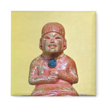Seated figure, possibly one  earliest magnets