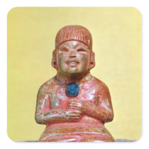 Seated figure, possibly one  earliest stickers