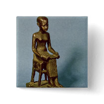 Seated statue of Imhotep  holding an open buttons