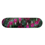 Several flowers of bleeding heart plant and water skate deck