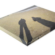 Shadows on the sand stretched canvas print