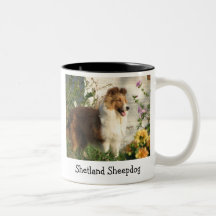 Sheltie standing in flowers mug