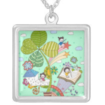 Side view of children studying by potted plant jewelry
