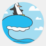 silly surfing penguin round sticker