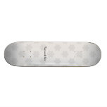 Silver snowflakes on silver background skate boards