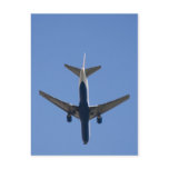 Single airplane on the blue sky background postcards