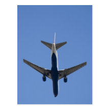 Single airplane on the blue sky background postcards