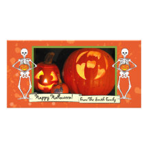 Skeletons holding pumpkins photo card