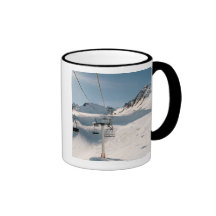 ski lift in sunny snowy landscape coffee mug