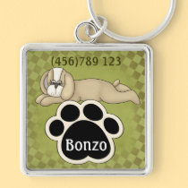 Sleeping Puppy and Pawprint Dog ID Tag keychains