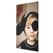 Small boy dressed as pirate stretched canvas prints