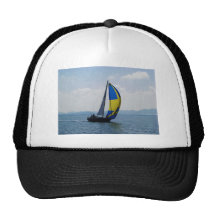 Small yacht big spinnaker. mesh hat