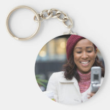 Smiling Business Woman with Cell Phone Key Chains