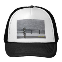 snowy day fence trucker hats