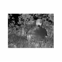 Solarized negative photograph of solo figure cut outs