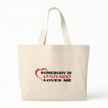 Somebody in Oxnard loves me t shirt bags