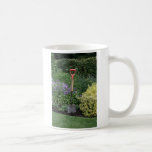 Spade in flower bed coffee mugs