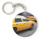 Speeding Yellow NY City Taxi Cab with Motion Blur keychains