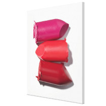 Stack of broken lipstick stretched canvas print