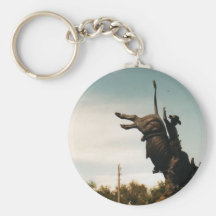 statue of a bullrider keychain
