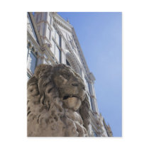 statue of a lion with the facade of Santa Croce Postcard
