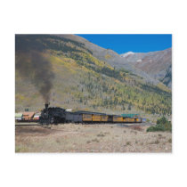 Steam train leaving town postcard