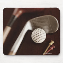 Still life if vintage golf clubs, tees and ball. mouse pad