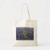 Stonewall with climbing plants tote bags