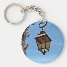 Street lamp against blue sky key chains