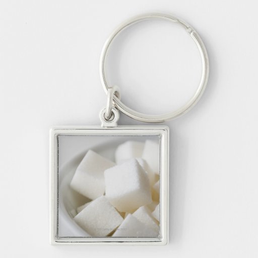 Studio shot of sugar cubes in bowl keychain