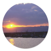 Sunset approach over Crete Harbour Round Stickers