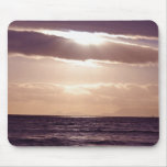 Sunset on a cloudy day mouse pads