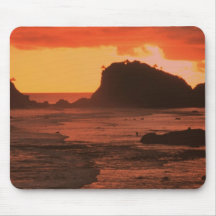 Sunset on a rocky coast mouse pad