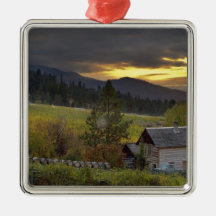 Sunset sky over vineyards and historic log cabin christmas tree ornament