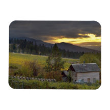 Sunset sky over vineyards and historic log cabin flexible magnet