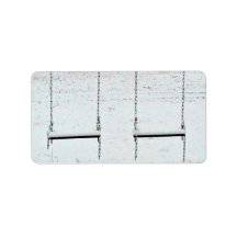 Swings covered with snow address label