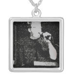 Talking figure black and white abstracted pendant