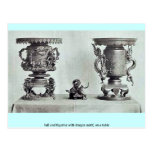 Tall and figurine with dragon motif, on a table post card
