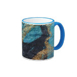 Tasse bleue de courants
