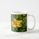 Tasse bleue jaune de fleur