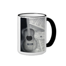 Tasse de musique de guitare et de feuille