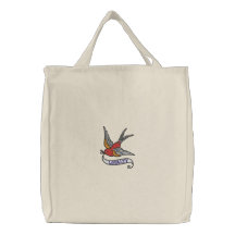 Tattoo bird with loyalty banner embroidered bag