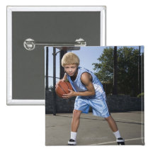 Teenage boy on basketball court 2 buttons
