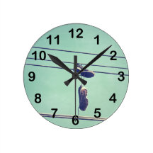Tennis Shoes on Power Line Clock