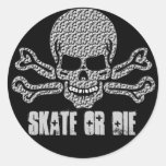 textured skull and crossbones round sticker