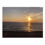 The beach at sunset postcard