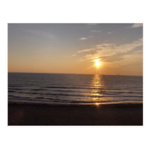 The beach at sunset postcard