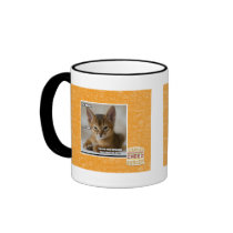 The feather is dead. coffee mugs