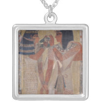The Goddess Hathor placing the magic collar necklaces